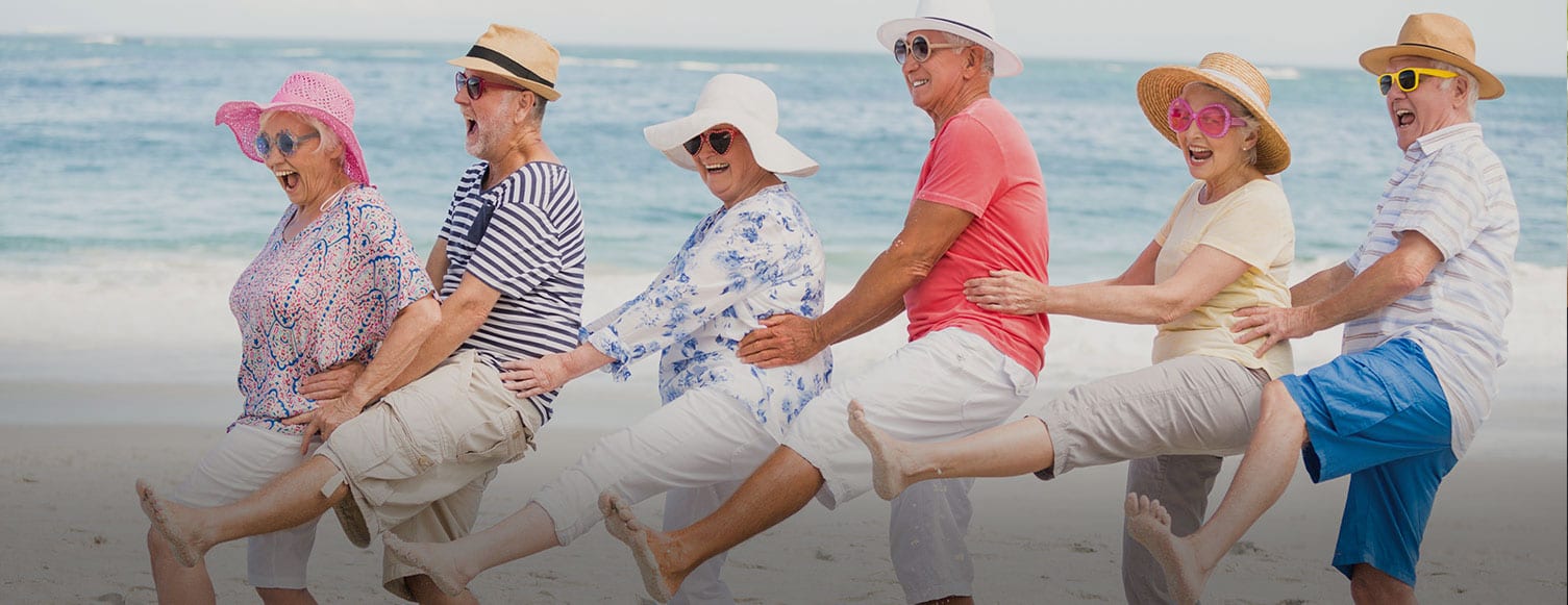 Cano Heath - Seniors dancing on beach