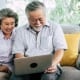 A senior couple using technology for a virtual visit included in their CMS telemedicine coverage