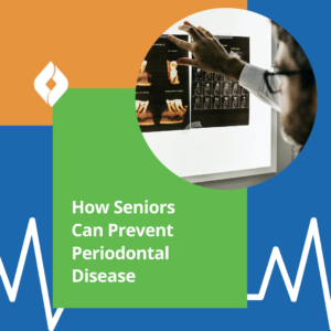 A dentist reviewing x-rays of a senor citizen patient with periodontal disease