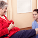 Nurse Performing Physical Therapy on Woman